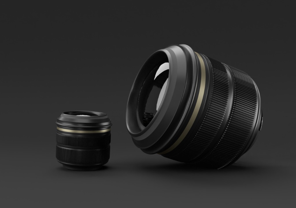 Mirrorless camera body and zoom lens floating on a dark background